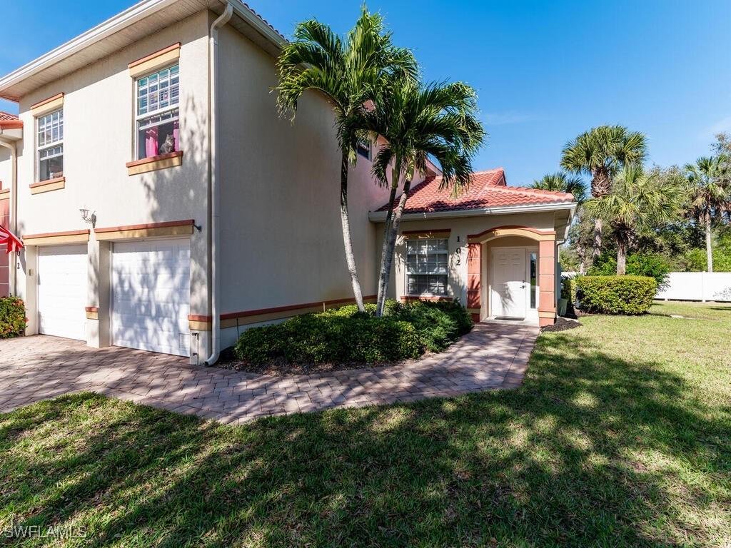 25058 Peacock Ln. #102, Naples, FL 34114