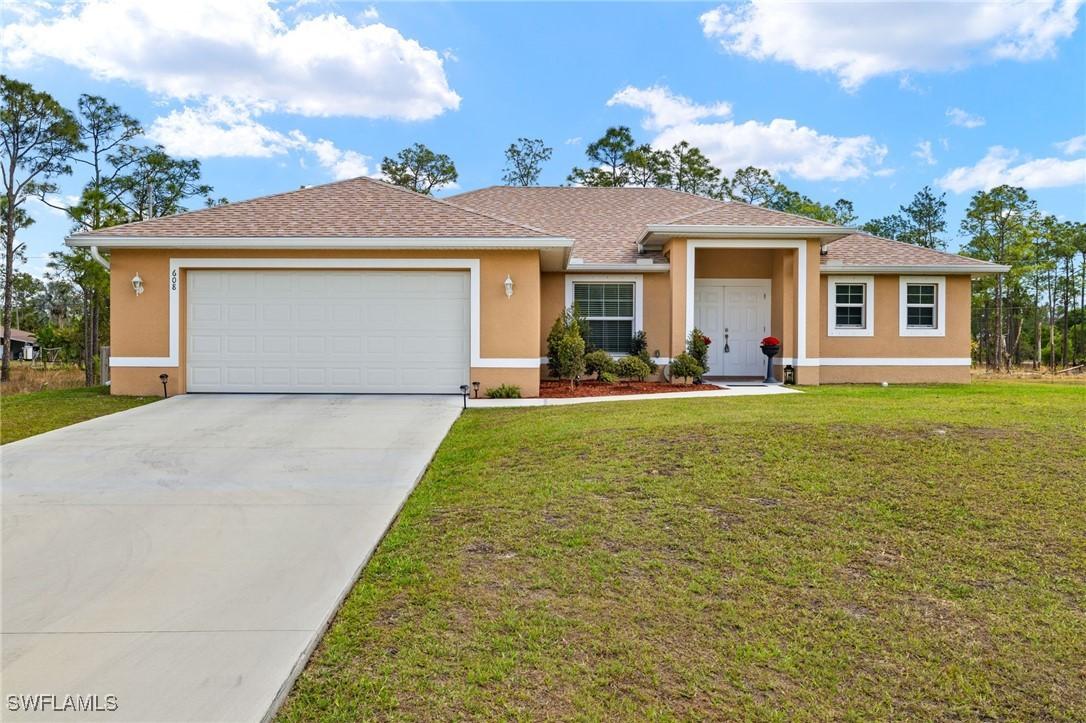 608 Truman Ave., Lehigh Acres, FL 33972