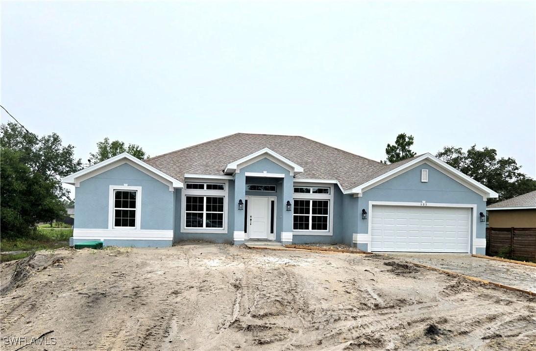 565 Windermere Dr., Lehigh Acres, FL 33972
