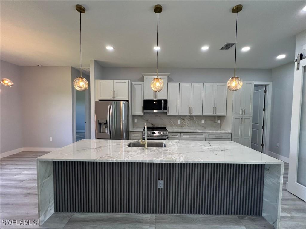 1104 Alaska Ave., Lehigh Acres, FL 33971