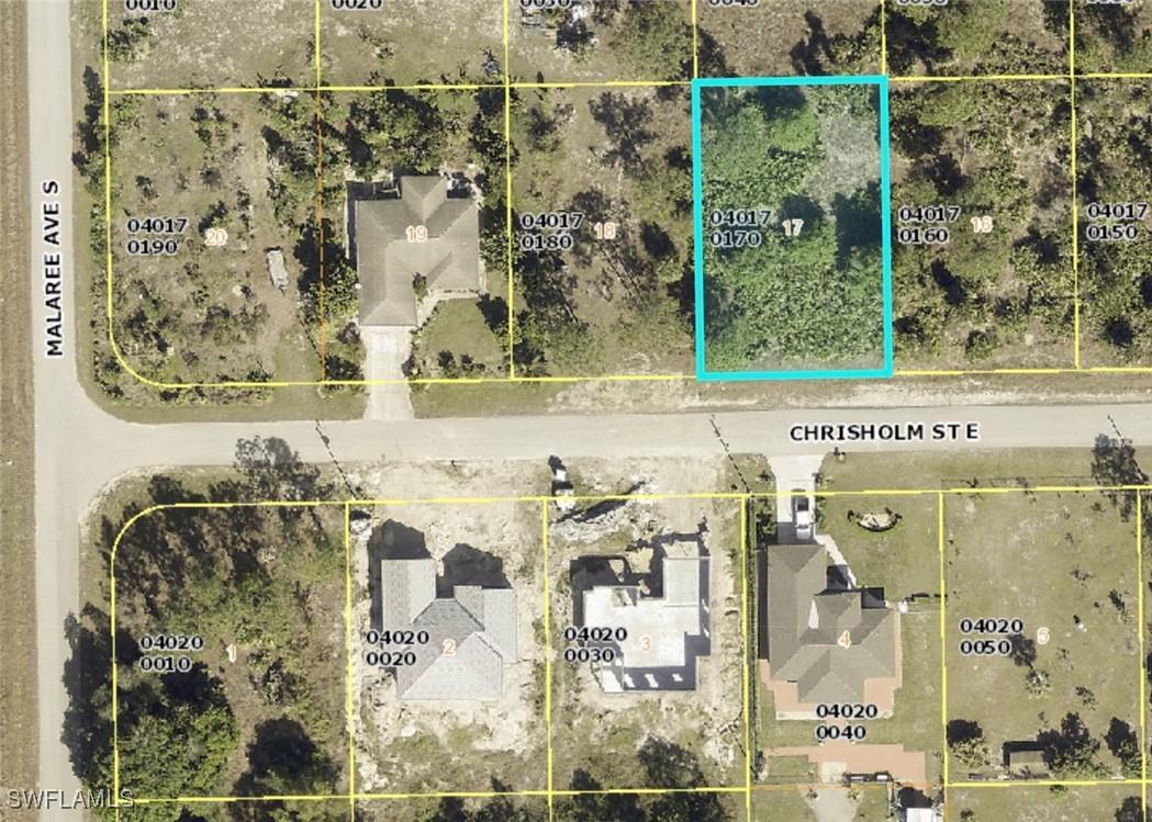 1229 Chrisholm St., Lehigh Acres, FL 33974