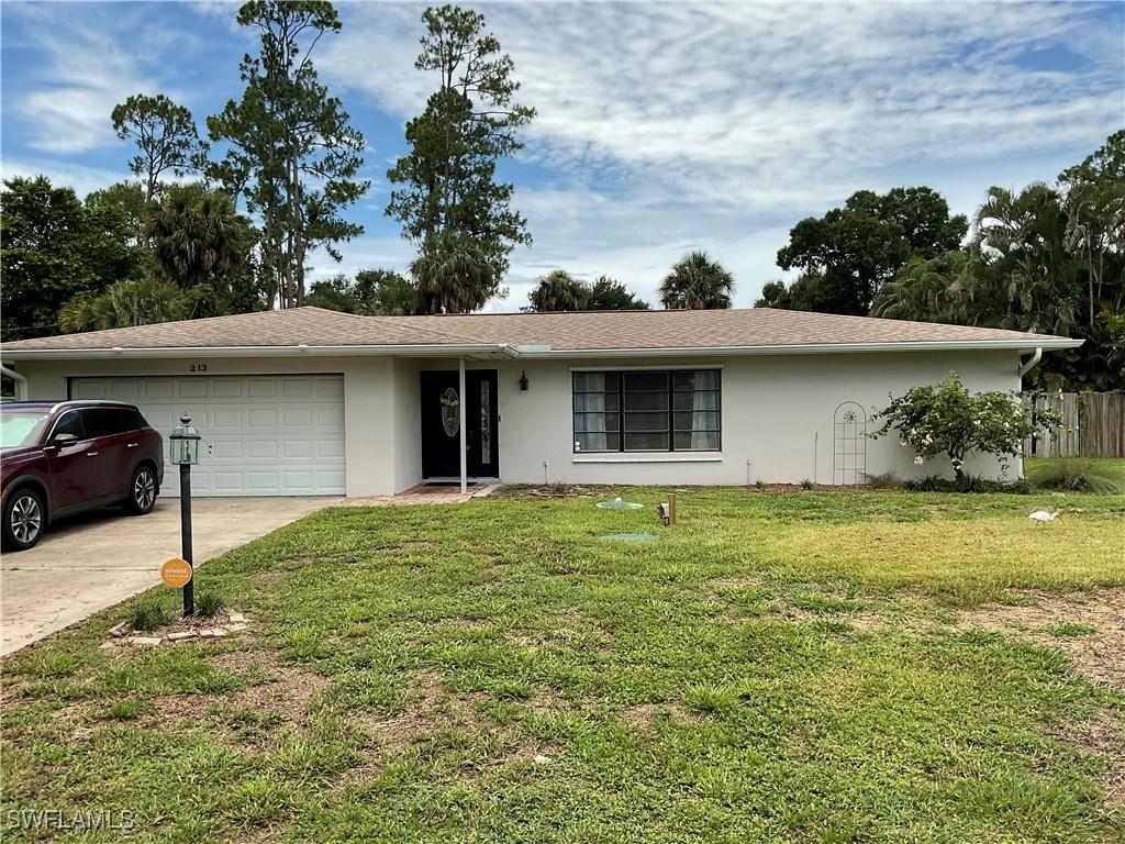 213 Lake Ave., Lehigh Acres, FL 33936