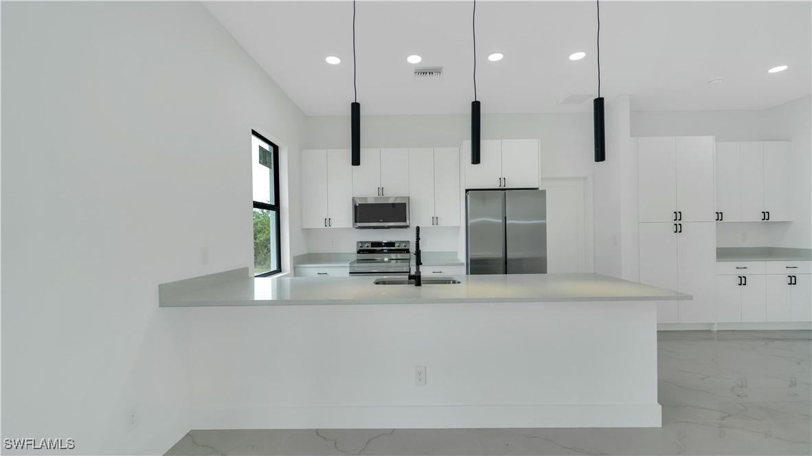 829 Frederick Reid St., Lehigh Acres, FL 33974