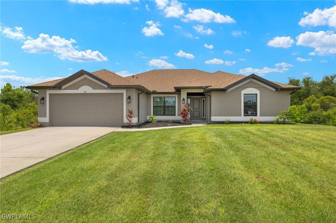 490 Windermere Dr., Lehigh Acres, FL 33972