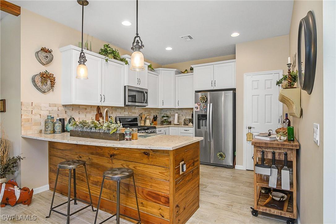 7642 Jacaranda Ln., Naples, FL 34114