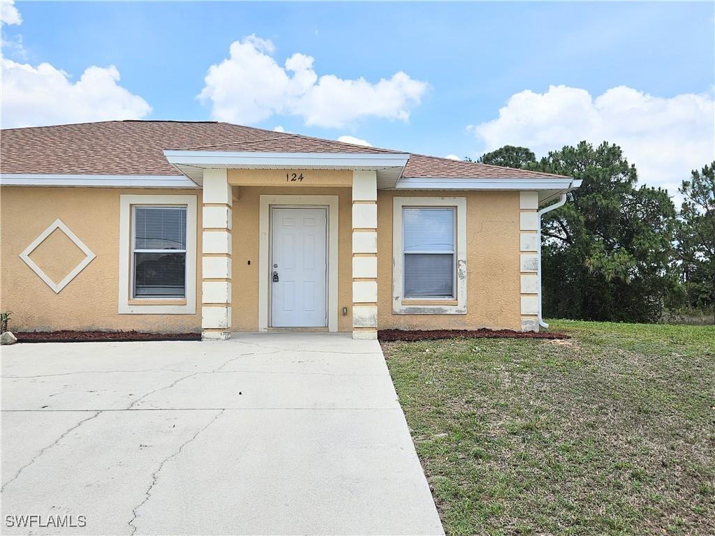 124/126 Ivan Ave., Lehigh Acres, FL 33973