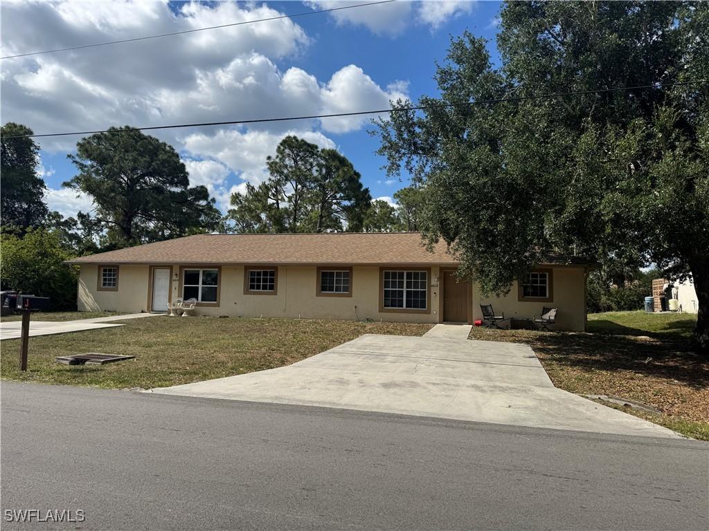 4614 Douglas Ln., Lehigh Acres, FL 33973