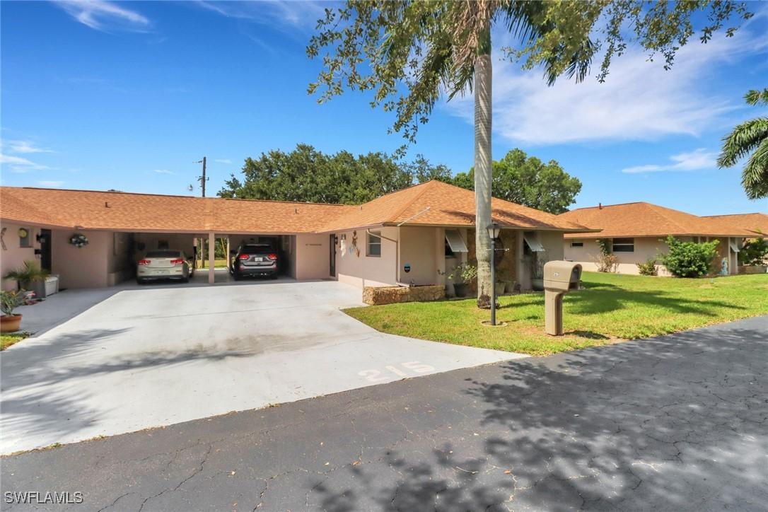 215 Oaklawn Ct., Lehigh Acres, FL 33936
