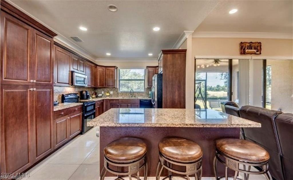 906 Sunniland Blvd., Lehigh Acres, FL 33971