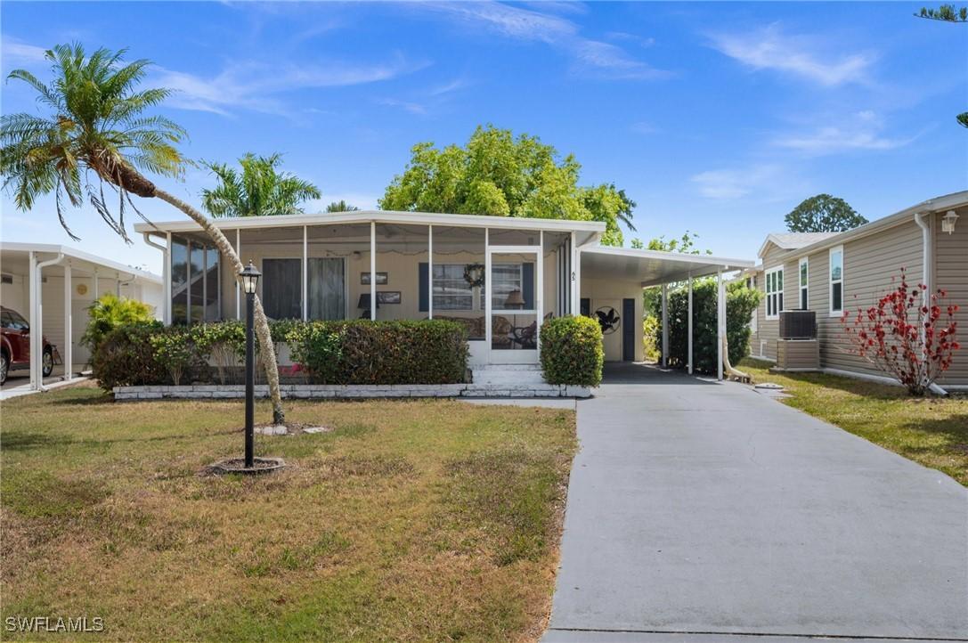 65 San Remo Cir., Naples, FL 34112