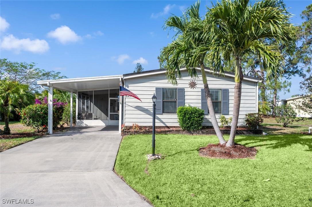 623 Charlemagne Blvd., Naples, FL 34112