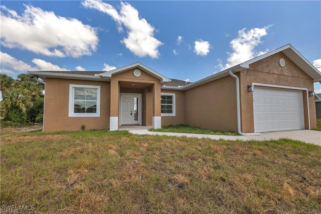 437 Mercedes Ct., Lehigh Acres, FL 33972