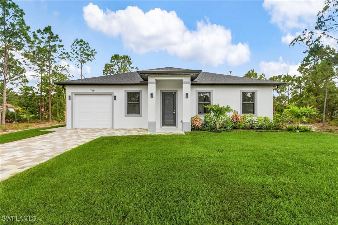 716 David Laird Ln., Lehigh Acres, FL 33974