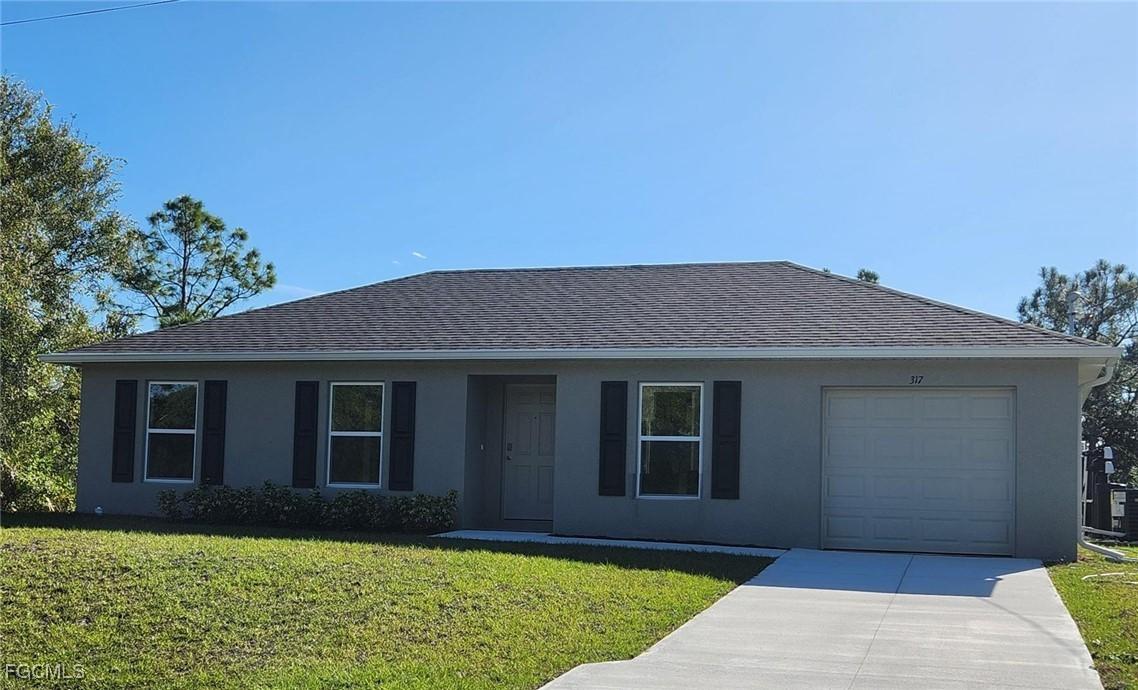 317 Broward Ave., Lehigh Acres, FL 33974