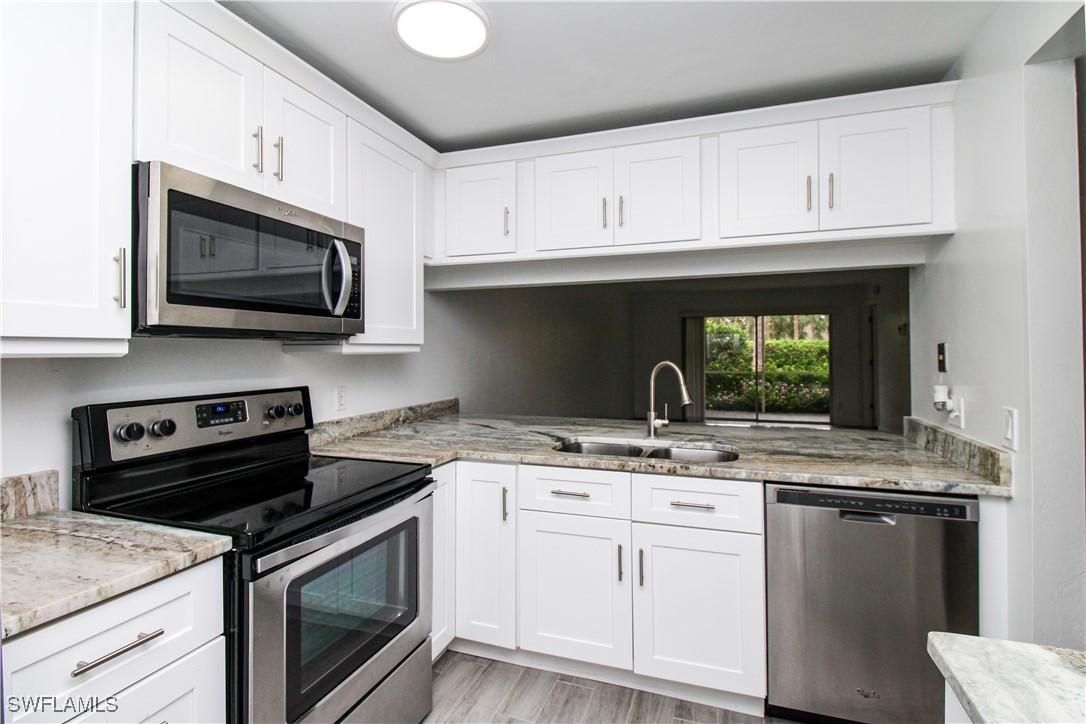 2566 Kings Lake Blvd. #104, Naples, FL 34112