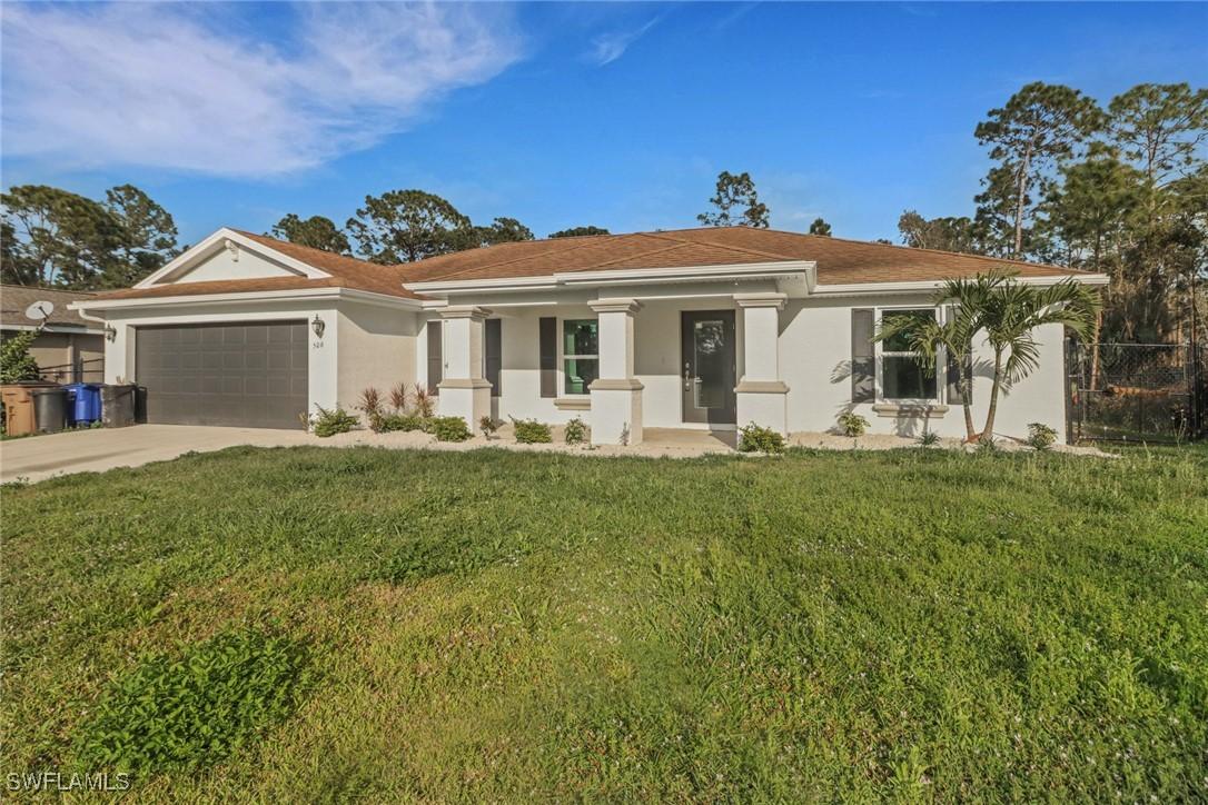 506 Hutton St., Lehigh Acres, FL 33974
