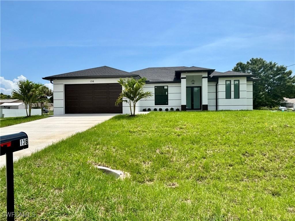 136 Carlisle Ave., Lehigh Acres, FL 33974