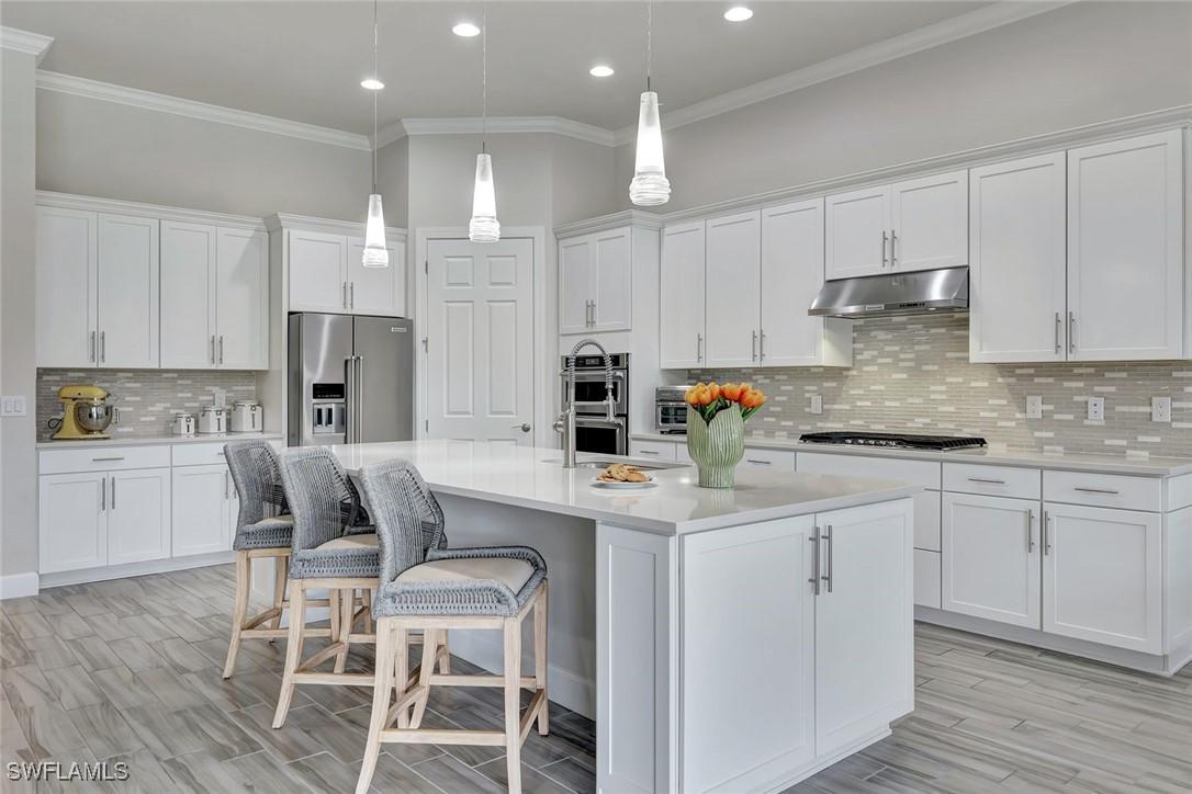 8868 Spotted Towhee Dr., Naples, FL 34120