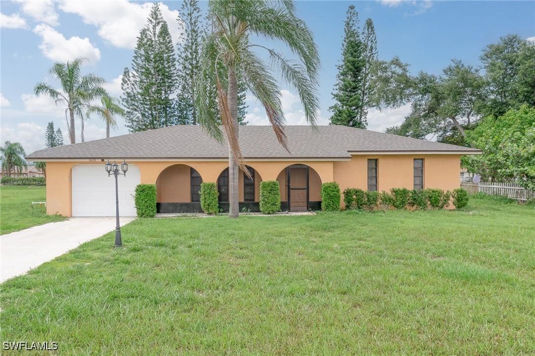 1438 Caywood Cir., Lehigh Acres, FL 33936