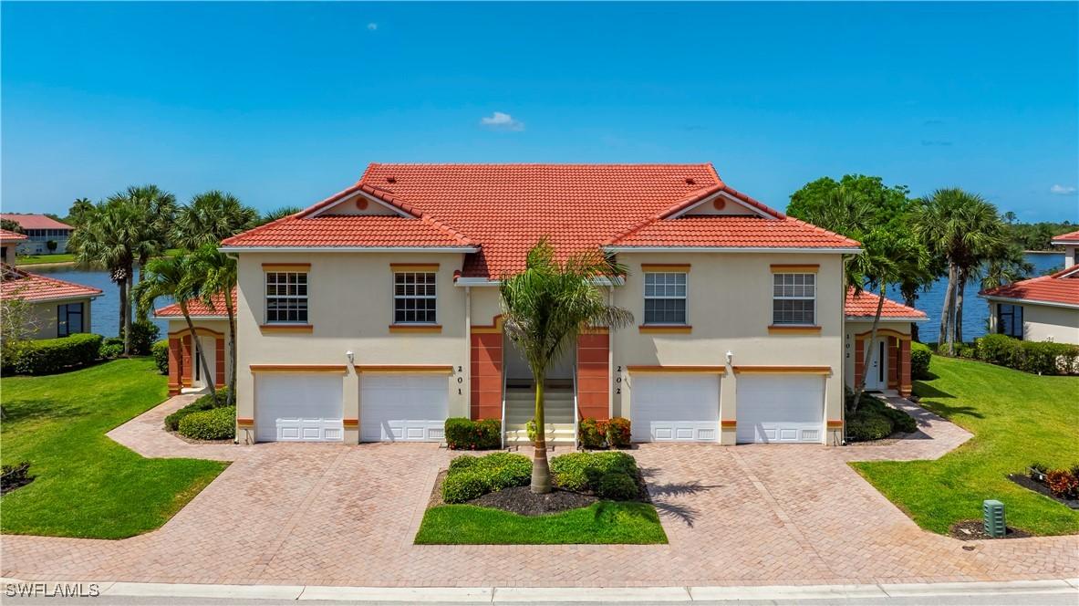 25057 Peacock Ln. #202, Naples, FL 34114
