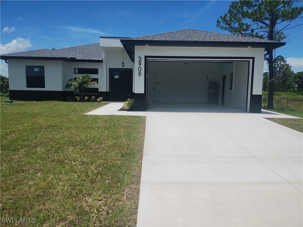 2909 Dora Ave., Lehigh Acres, FL 33971