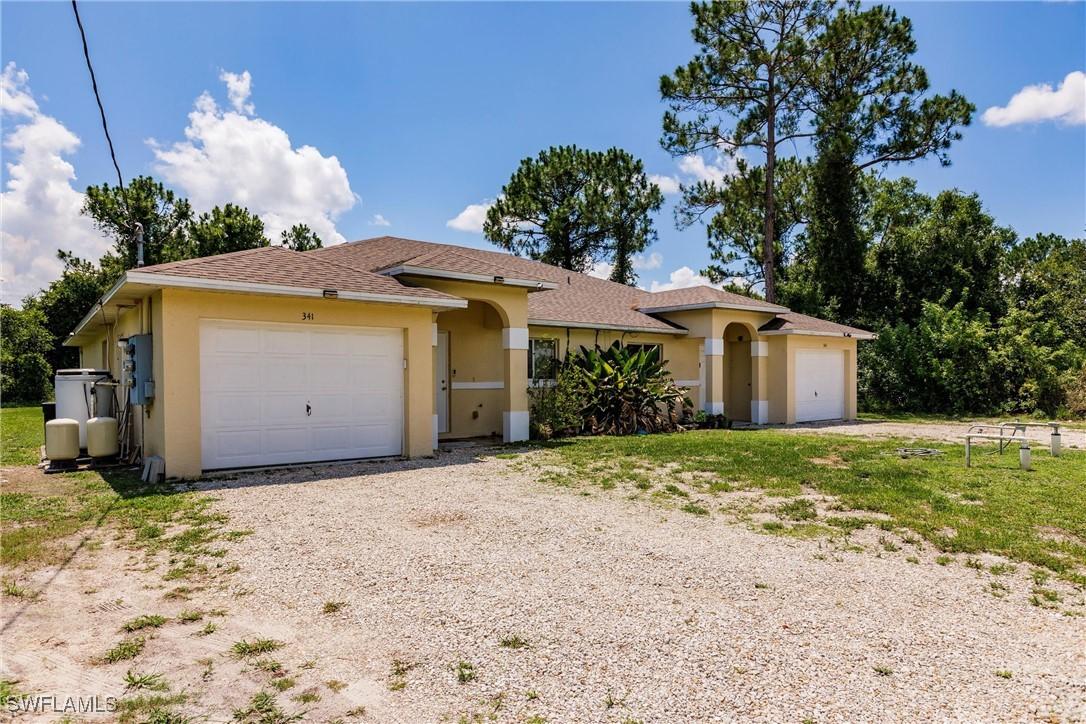 341 Lillon Ave., Lehigh Acres, FL 33974