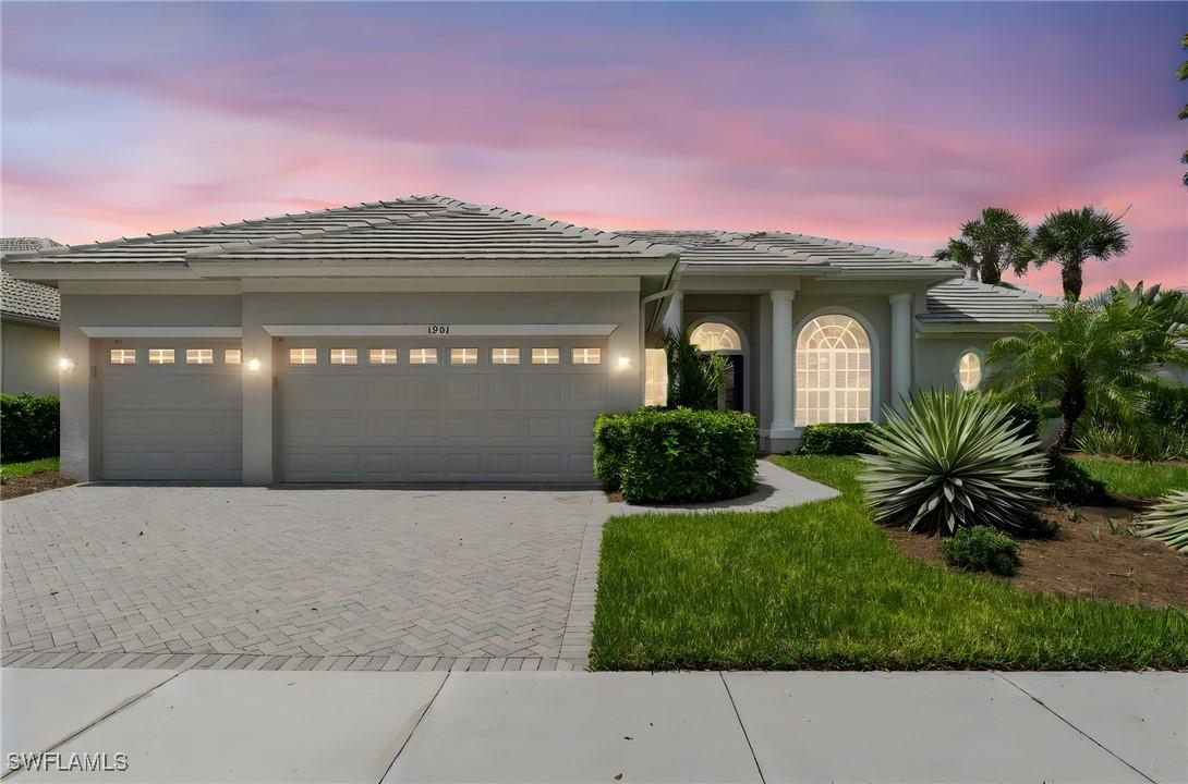 1901 Winding Oaks Way, Naples, FL 34109