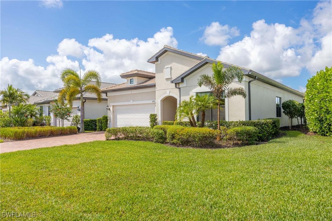 6787 Winding Cypress Dr., Naples, FL 34114