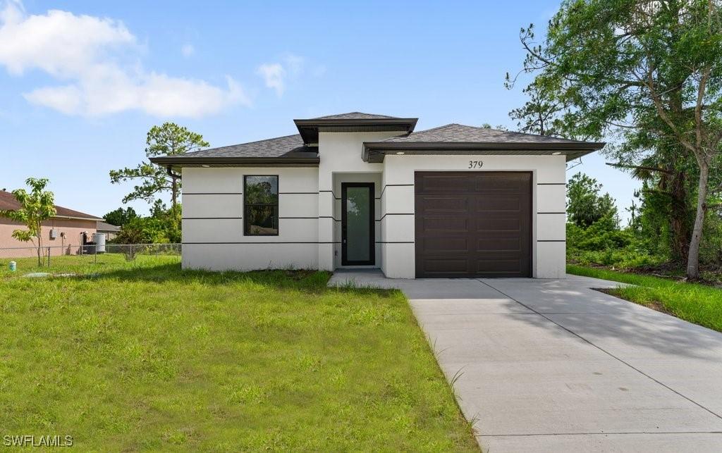 379 Selkirk Ave., Lehigh Acres, FL 33974