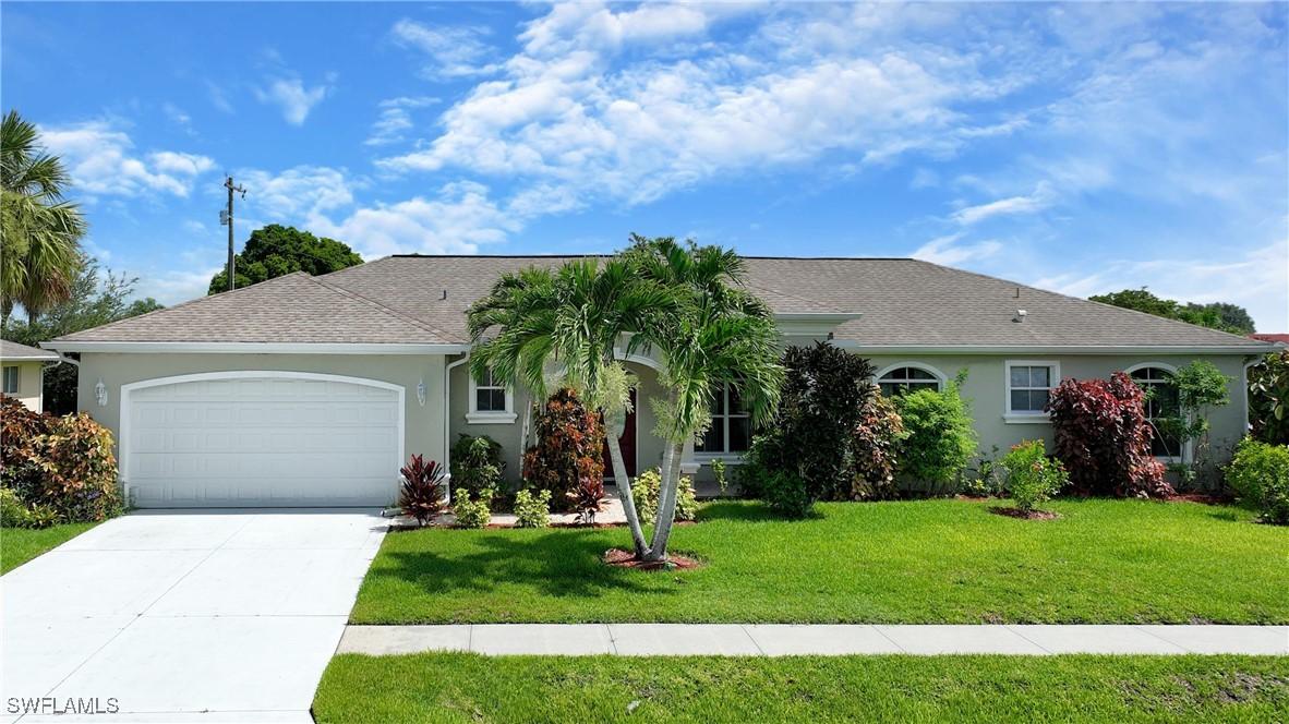 599 Genevieve Dr., Lehigh Acres, FL 33936