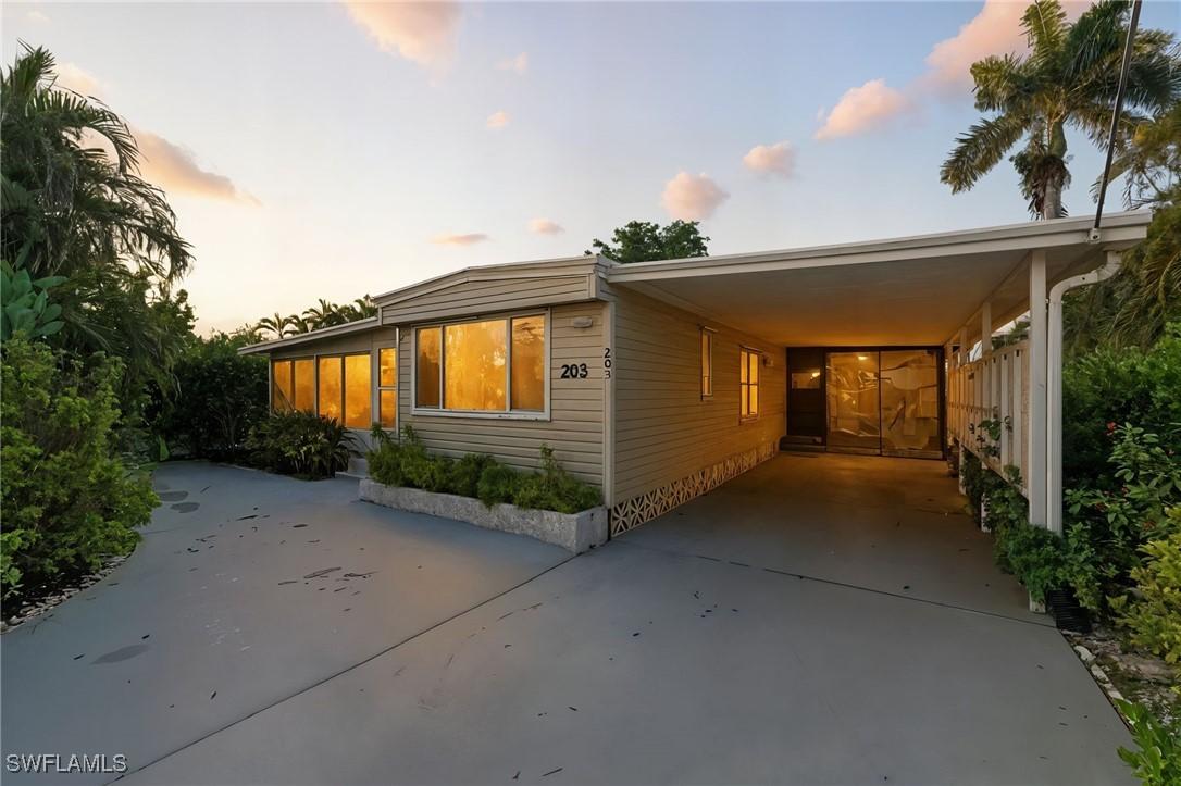 203 Rookery Rd., Naples, FL
