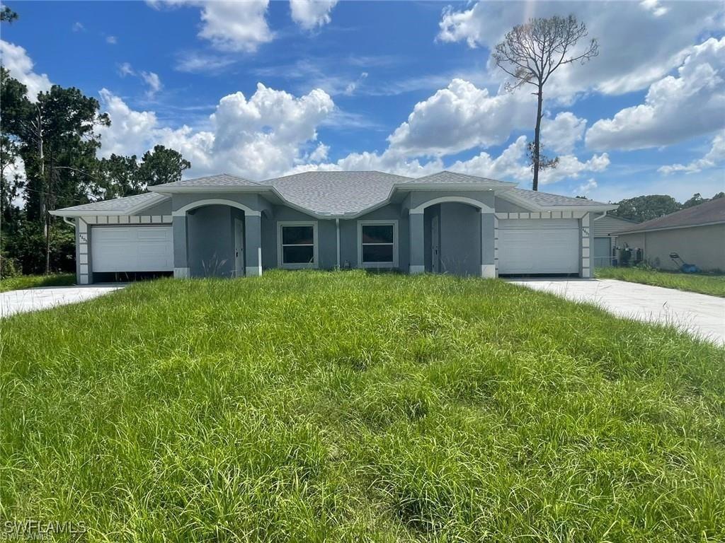397/399 Carrillon Ave., Lehigh Acres, FL 33974