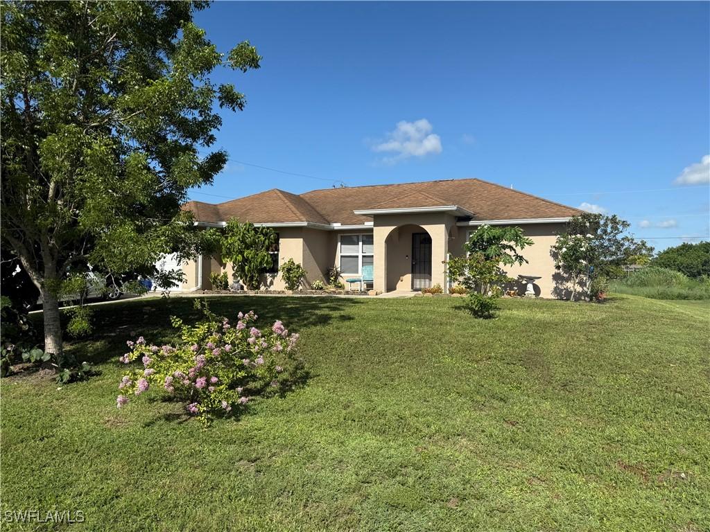 107 Indiana Pl., Lehigh Acres, FL 33936