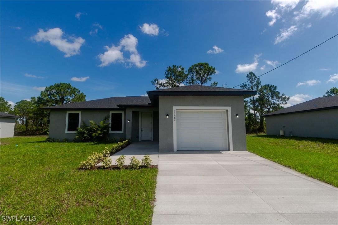1127 Deauville St., Lehigh Acres, FL 33974