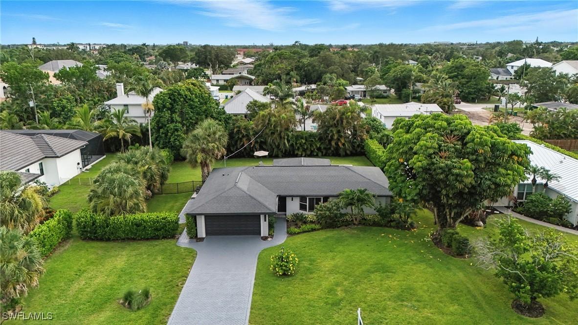 1132 Cypress Woods Dr., Naples, FL 34103