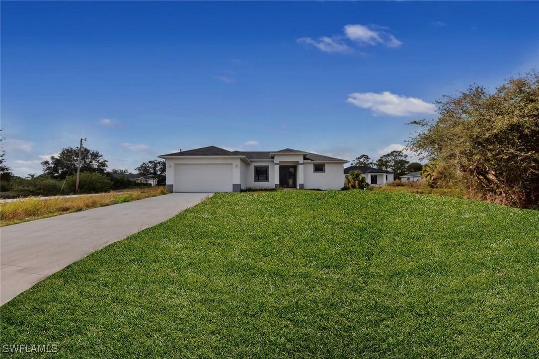352 Rawlings Ave., Lehigh Acres, FL 33974