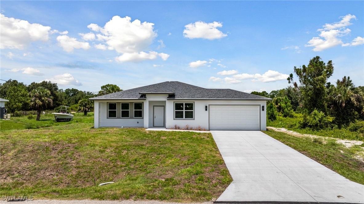 1909 Moore Ave., Lehigh Acres, FL 33972