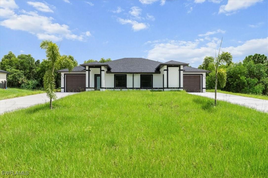 668/670 Chemstrand St., Lehigh Acres, FL 33974