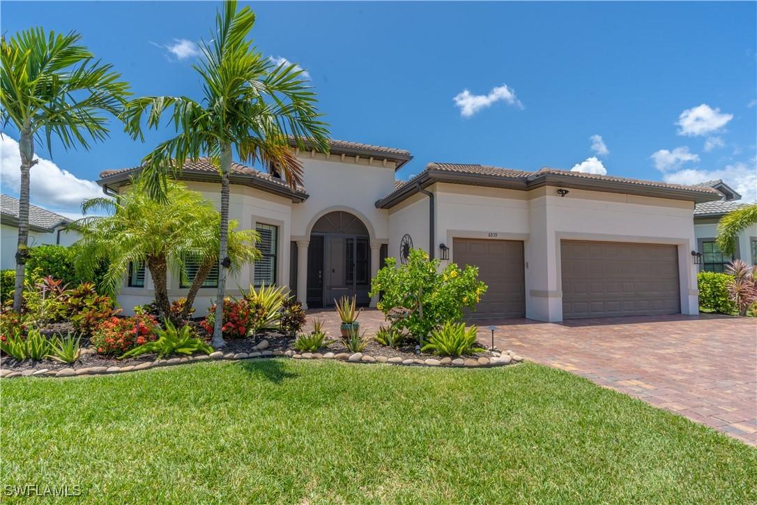 6839 Winding Cypress Dr., Naples, FL 34114