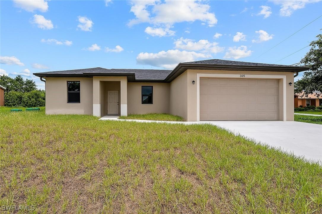 305 Norman Ave., Lehigh Acres, FL 33971