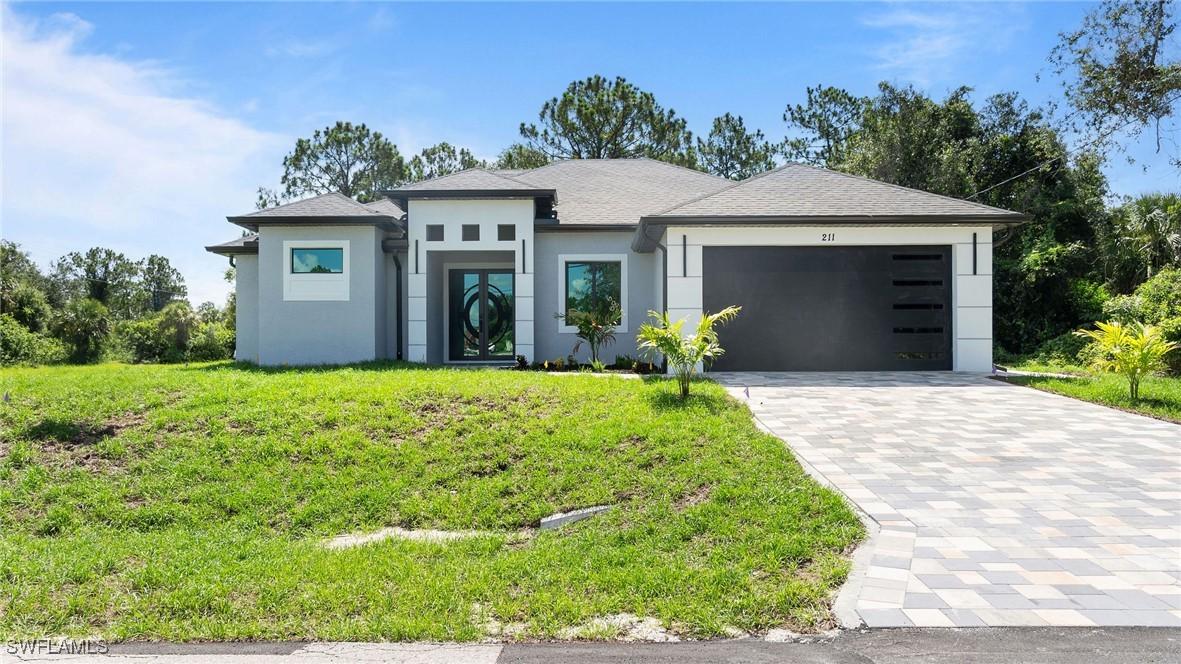 211 Thornton Ave., Lehigh Acres, FL 33974