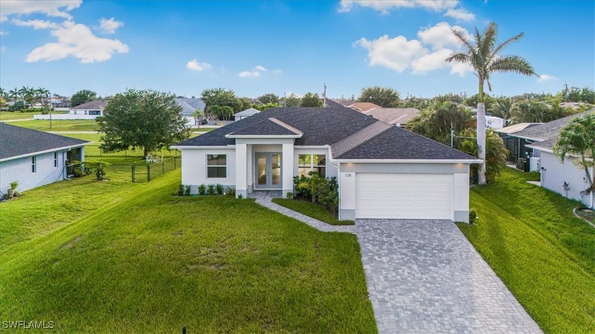 128 NW 26th Pl., Cape Coral, FL 33993
