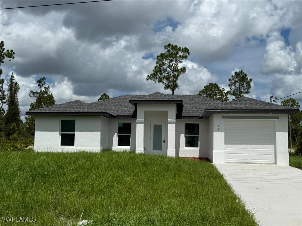 322 Mcarthur Blvd., Lehigh Acres, FL 33974