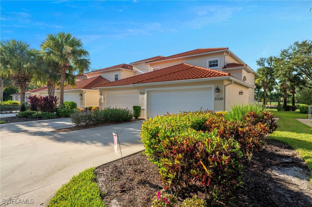 3330 Grand Cypress Dr. #202, Naples, FL 34119