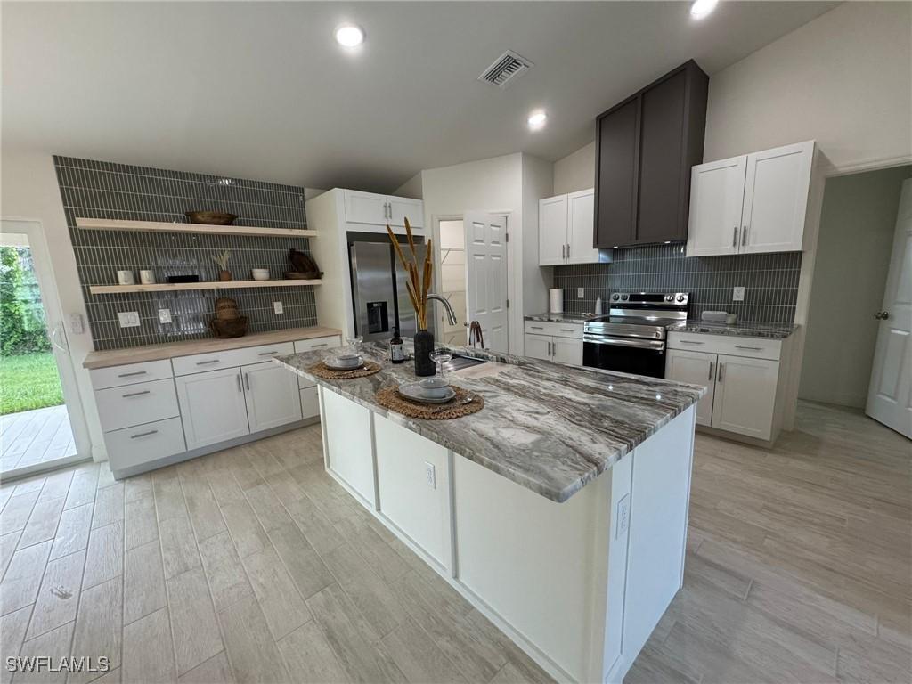 1027 Alfreda Ave., Lehigh Acres, FL 33971