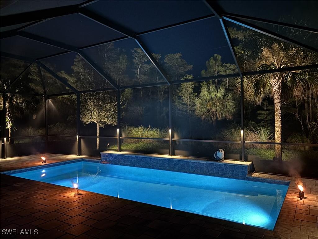 6902 Winding Cypress Dr., Naples, FL 34114