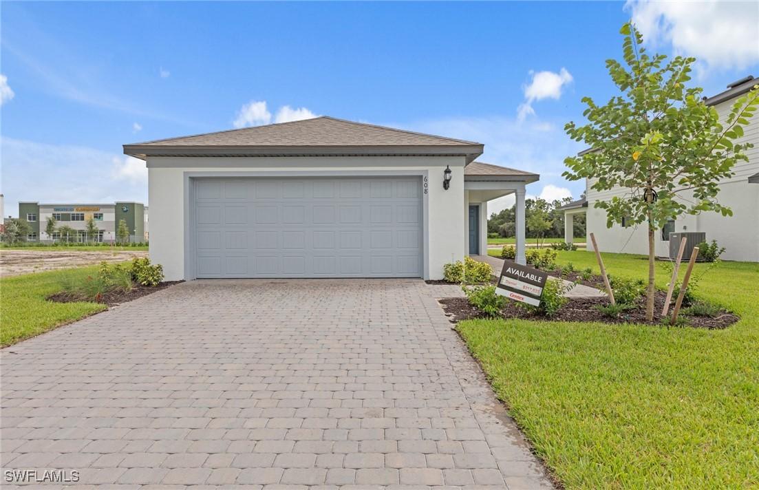 608 Lakeside Oasis Ave., Lehigh Acres, FL 33974