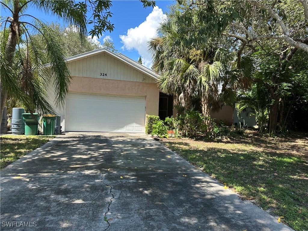 324 Sharwood Dr., Naples, FL 34110