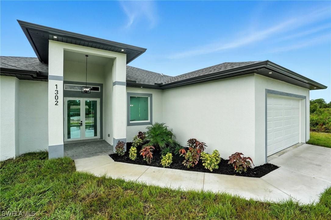 1302 Plumosa Ave., Lehigh Acres, FL 33972