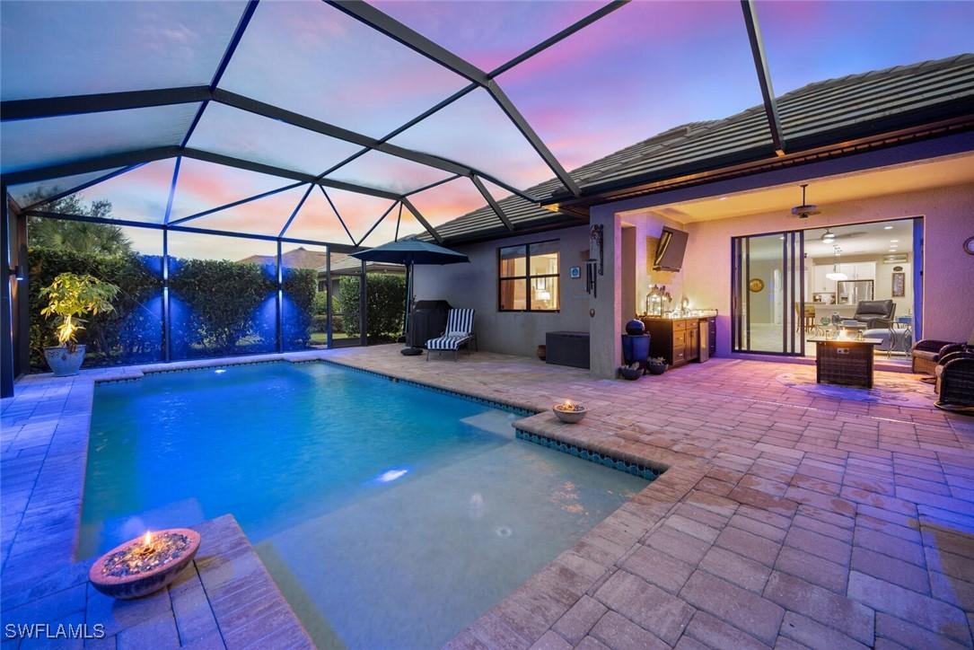 7457 Winding Cypress Dr., Naples, FL 34114